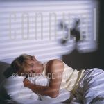 05-07-1985 Benny Neyman in studio te Amsterdam.

[keywords]Posed, Half Length, Eyecontact, Bed, Shadow[/keywords]